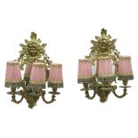 A pair of Victorian gilt metal three-lig