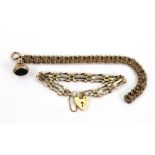 A gold gate-link bracelet, on 9ct gold h