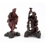 A Chinese carved redwood figure group an