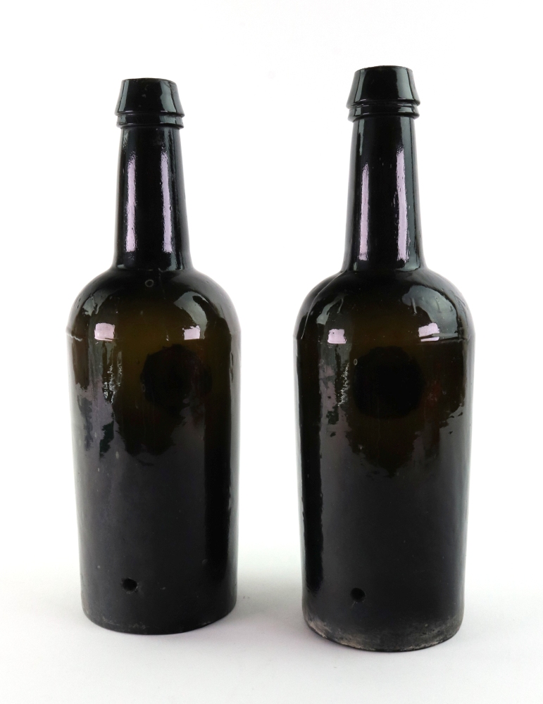 A pair of green glass wine bottles, by H - Image 2 of 10