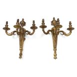 A pair of Regency style ormolu wall appl