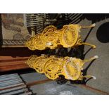 A set of six 20th century yellow painted cast metal garden chairs, (6).