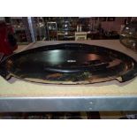 Jennens & Bettridge, makers to The Queen; a 19th century painted oval papier-mache tray, 78cm wide.