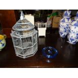 A 20th century grey painted bird cage, 65cm high and a Whitefriars style blue glass bowl,
