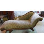 A 19th century walnut framed chaise longue with roll-over end, 143cm wide.