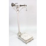 A set of cast iron personal weighing scales, by Young Son & Marlow, Westminster, early 20th century,