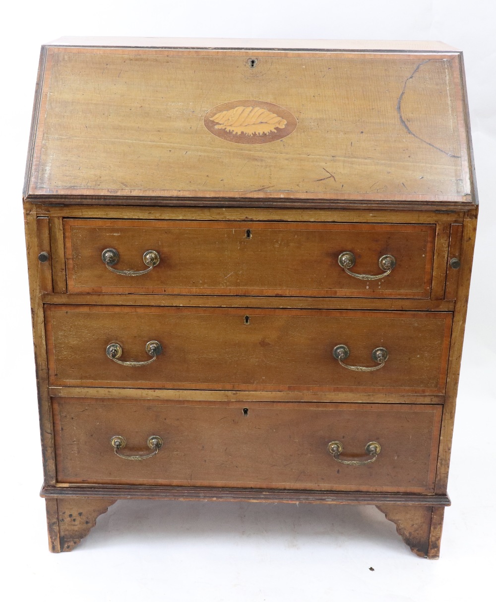 An Edwardian mahogany satinwood crossbanded and inlaid bureau, with three drawers under, 76.