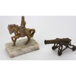 A gilt metal figure of Napoleon on horseback, first half 20th century,