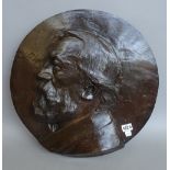 A Belgian bronze circular wall plaque, early 20th century, by Alphonse Joseph Strymans (Belgian,