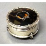 A silver and tortoiseshell lidded shaped circular trinket box,