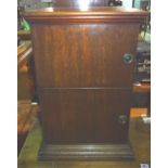 A early 20th century mahogany bedside cupboard on plinth base, 41cm wide x 61cm high.