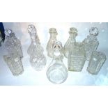 Glass, comprising; eight cut glass decanters and two cut glass goblets.