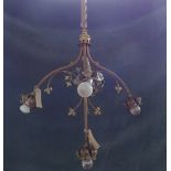 A set of three gilt metal four branch altar chandeliers, late 19th/ early 20th century,