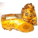In the manner of a 'Yorkshire Critter', a burr yew stand with dug out ashtray,
