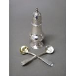 Silver, comprising; a George III baluster shaped caster, raised on a circular foot,