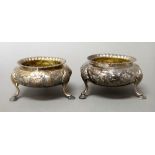 A pair of Victorian silver salts, each of circular form,