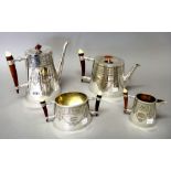 A Victorian plated four piece tea and coffee set, comprising; a teapot, a coffee pot,