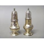 Two silver baluster shaped pepperettes, one base London 1753, the other base London 1769,