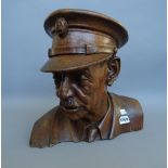 A carved walnut bust depicting a naval officer, 20th century, unsigned, 34cm high.