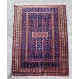 A Turkeman prayer rug, the stylised stepped Mihrab with central panel,