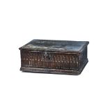 A 17th century oak bible box, the single plank top over an arcade carved frieze,