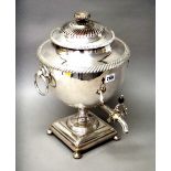 A Victorian plated on copper twin handled tea urn, with a detachable cover,