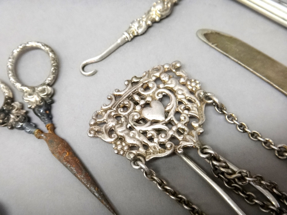 A late Victorian silver chatelaine clip, fitted with three swivels to the pendant chains, - Image 3 of 3