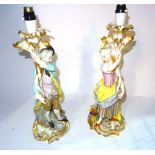 A pair of 20th century figural porcelain table lamps formed as a gallant and his companion,