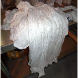 A quantity of Edwardian christening gowns and bonnets of various sizes, (qty).