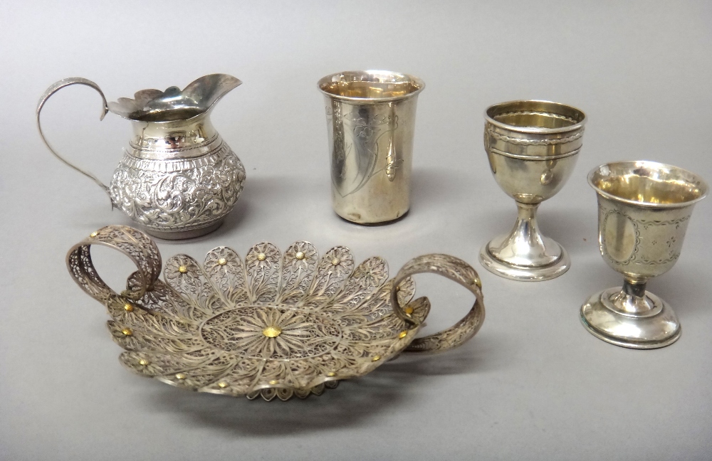 Foreign wares, comprising; a beaker engraved Maurice, detailed 800, two egg cups,