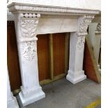 A 20th century white painted fire surround with floral and egg and dart decoration,