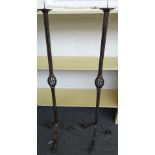 A pair of 16th century style wrought iron altar candlesticks, modern, of fluted form,