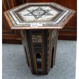 A 19th century North African mother-of-pearl inlaid hardwood octagonal occasional table with