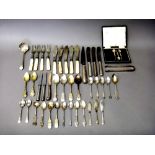 Silver flatware, comprising; an Old English and shell pattern sauce ladle, with engraved decoration,