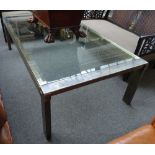 A mid-20th century lacquered brass rectangular coffee table, on block supports,