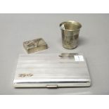 A Swedish rectangular cigarette case, the exterior with banded decoration,
