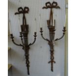 A pair of Georgian style giltwood carved three branch wall appliques, early/ mid-20th century,