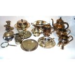A group of silver plated wares, comprising; a pair of entree dishes, a pair of chamber sticks,