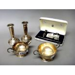 Silver and silver mounted wares, comprising; a milk jug and a matching twin handled sugar bowl,