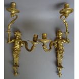 A pair of French ormolu twin branch wall lights in the manner of Andre-Charles Boulle, 19th century,