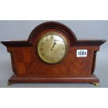 An Edwardian mahogany and inlaid dome top mantel clock with engine turned dial,