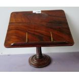 A 19th century rosewood table top reading lectern on fluted column,