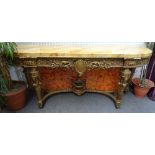 An 18th century Continental style console table, the gilded base with carved and pierced decoration,