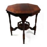 An Edwardian walnut window table, the oc