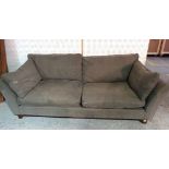 A 20th century hardwood framed two seat sofa with grey upholstery on block supports, 230cm wide.
