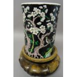 A Chinese famille-noire cylindrical brush pot, six character Kangxi mark but later,