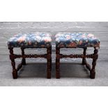 A pair of oak framed rectangular stools, with button upholstered over-stuffed tops,