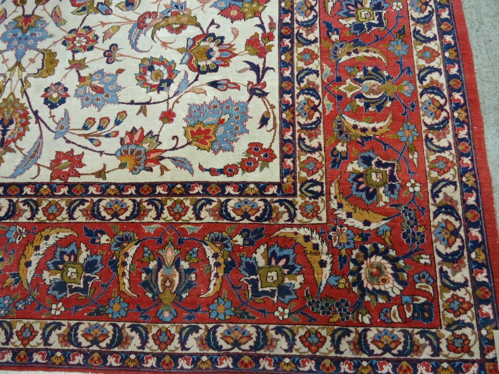 Isfahan carpet, Persian, the ivory field with all over palmette and floral sprays, - Image 3 of 6