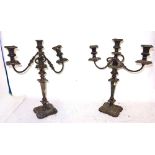 A pair of silver plated three light table candelabra, 47cm tall (2).