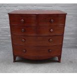 A Regency mahogany bowfront chest of two short and three long graduated drawers,